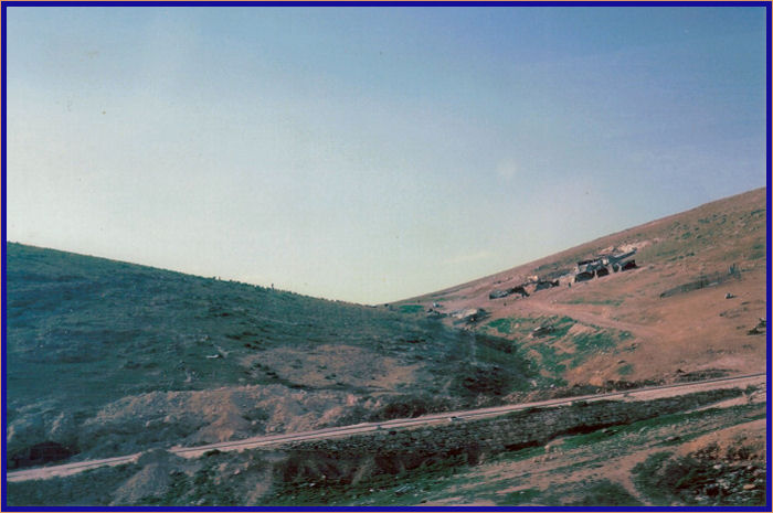 Bedouins living on the side of a hill by the Jerusalem-Jericho Rd